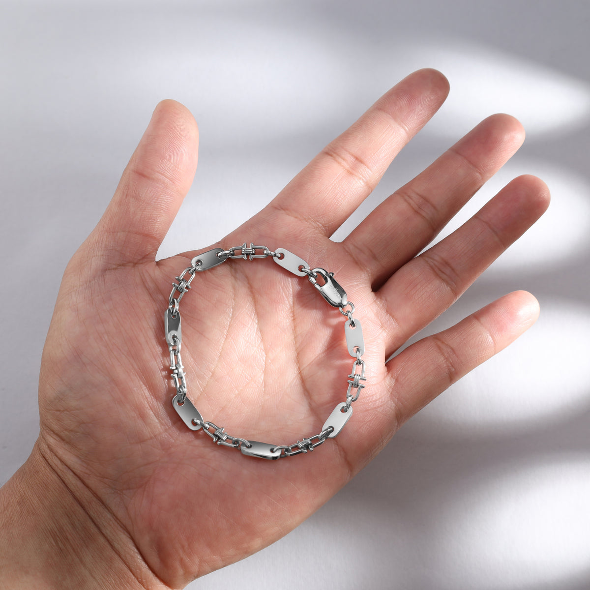 Plattenkette Armband mit beweglichen Steigbügeln 5mm breit aus Edelstahl - Taipan Schmuck