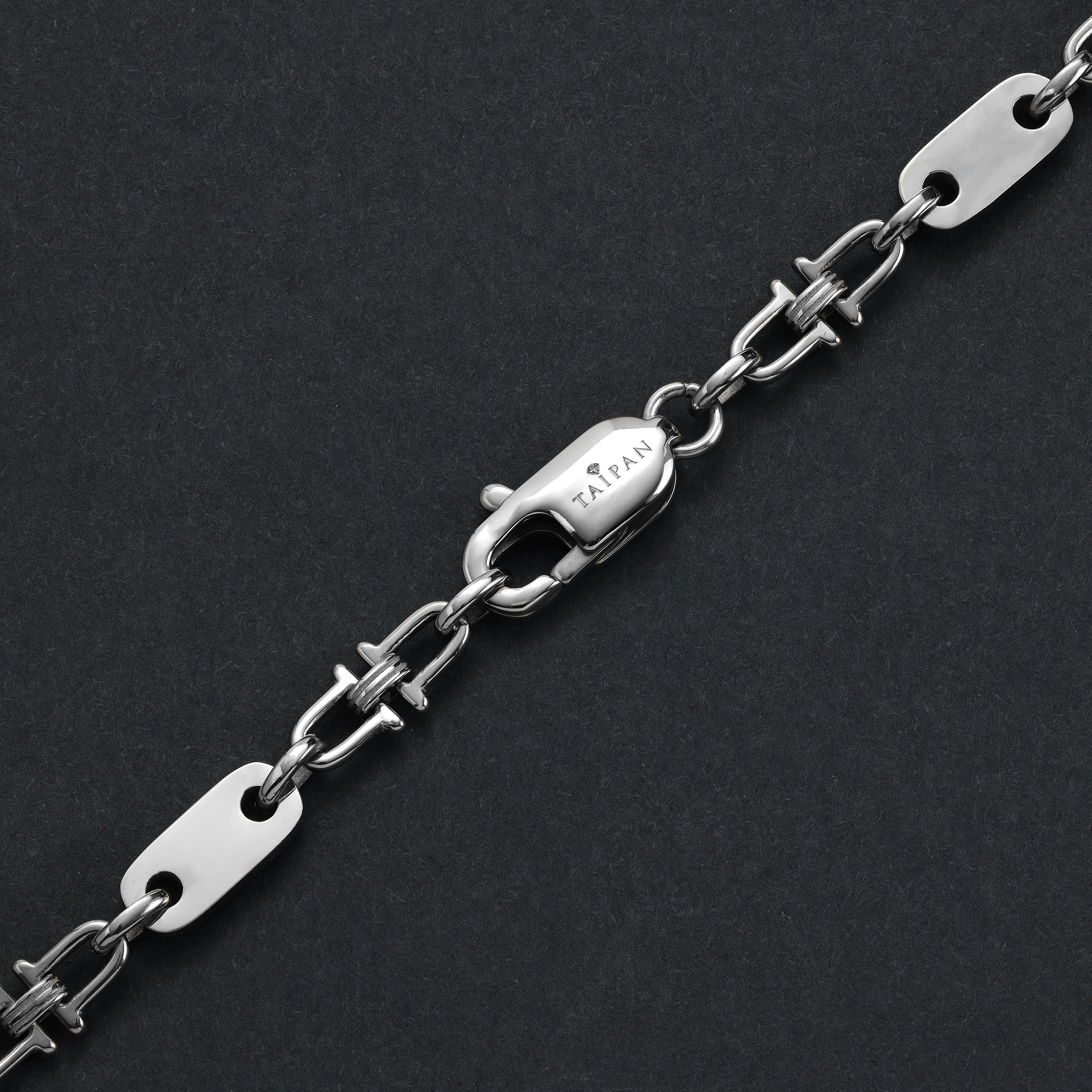 Plattenkette mit beweglichen Steigbügeln 5mm breit aus Edelstahl - Taipan Schmuck