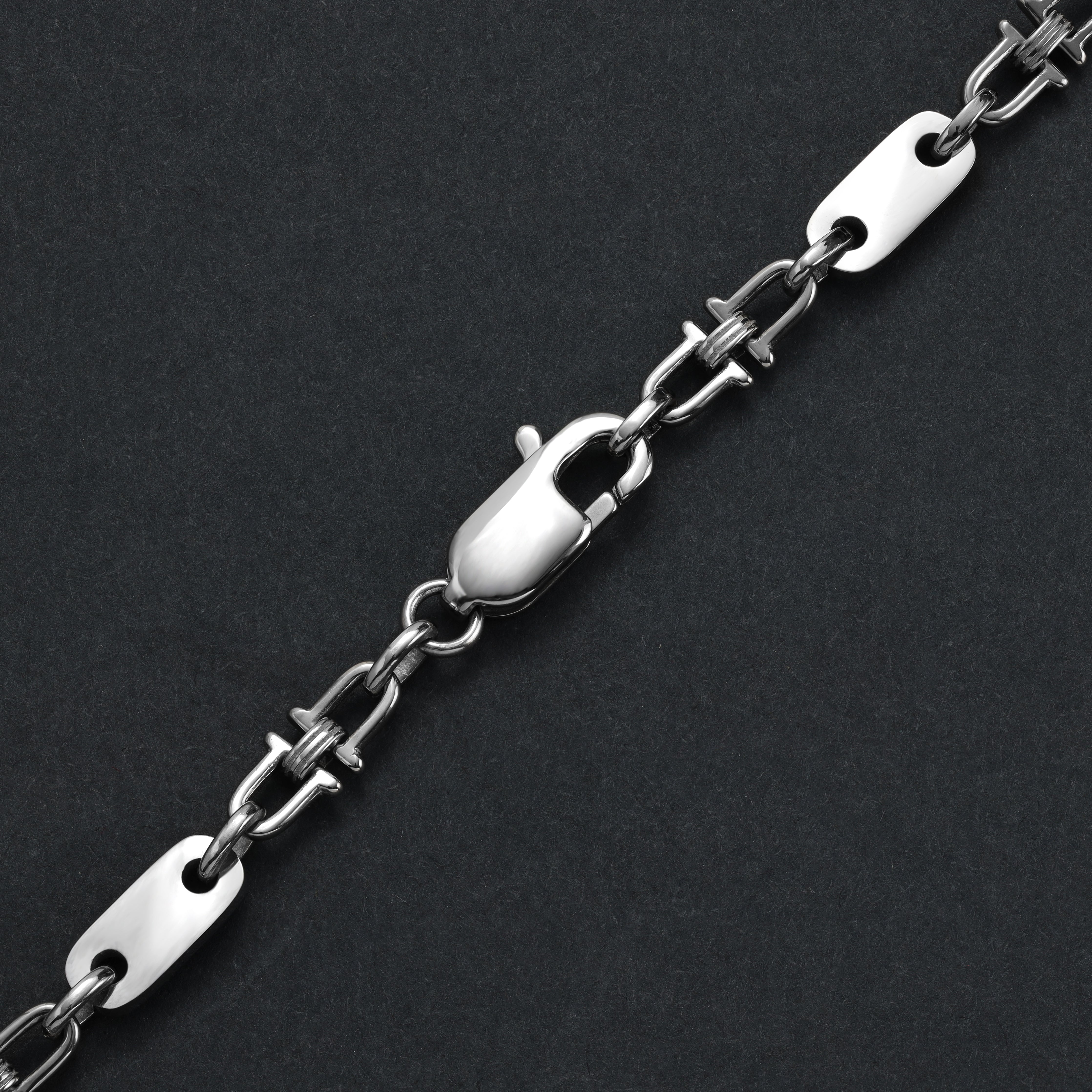 Plattenkette mit beweglichen Steigbügeln 5mm breit aus Edelstahl - Taipan Schmuck