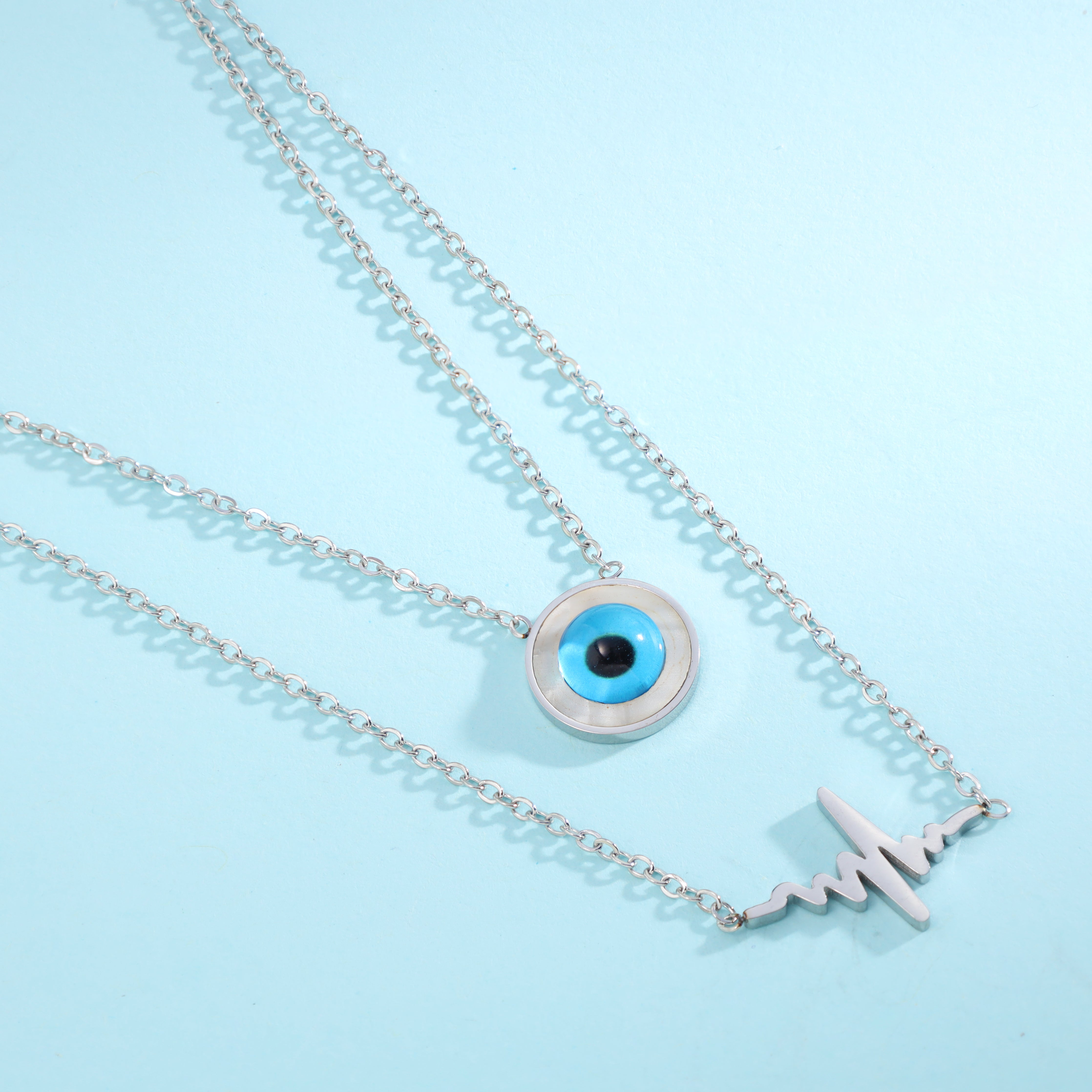 Layering Damenkette mit Herzschlag und Evil Eye Nazar Anhänger aus Edelstahl - Taipan Schmuck