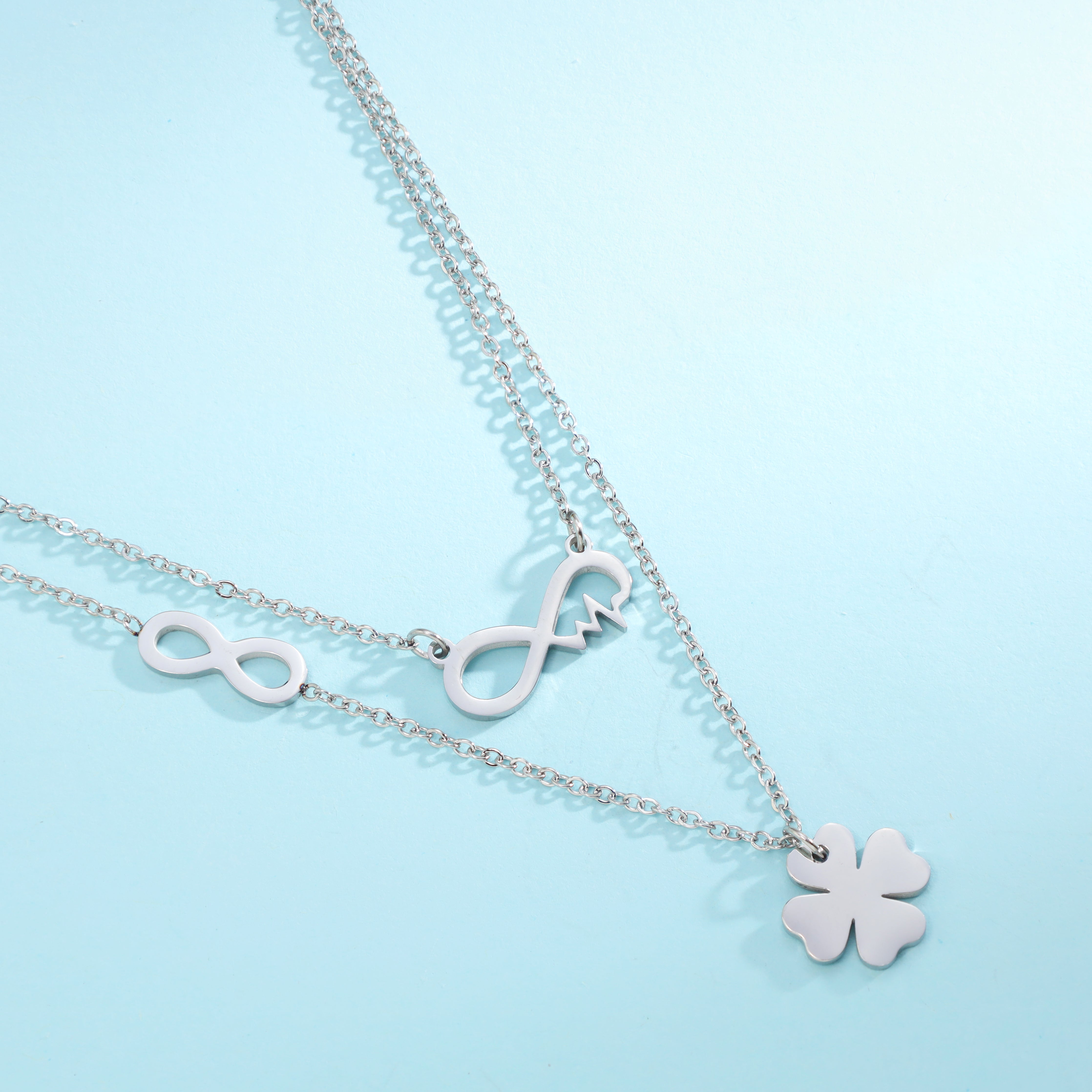 Damen Kette Infinity Herzschlag + Kleeblatt aus Edelstahl - Taipan Schmuck