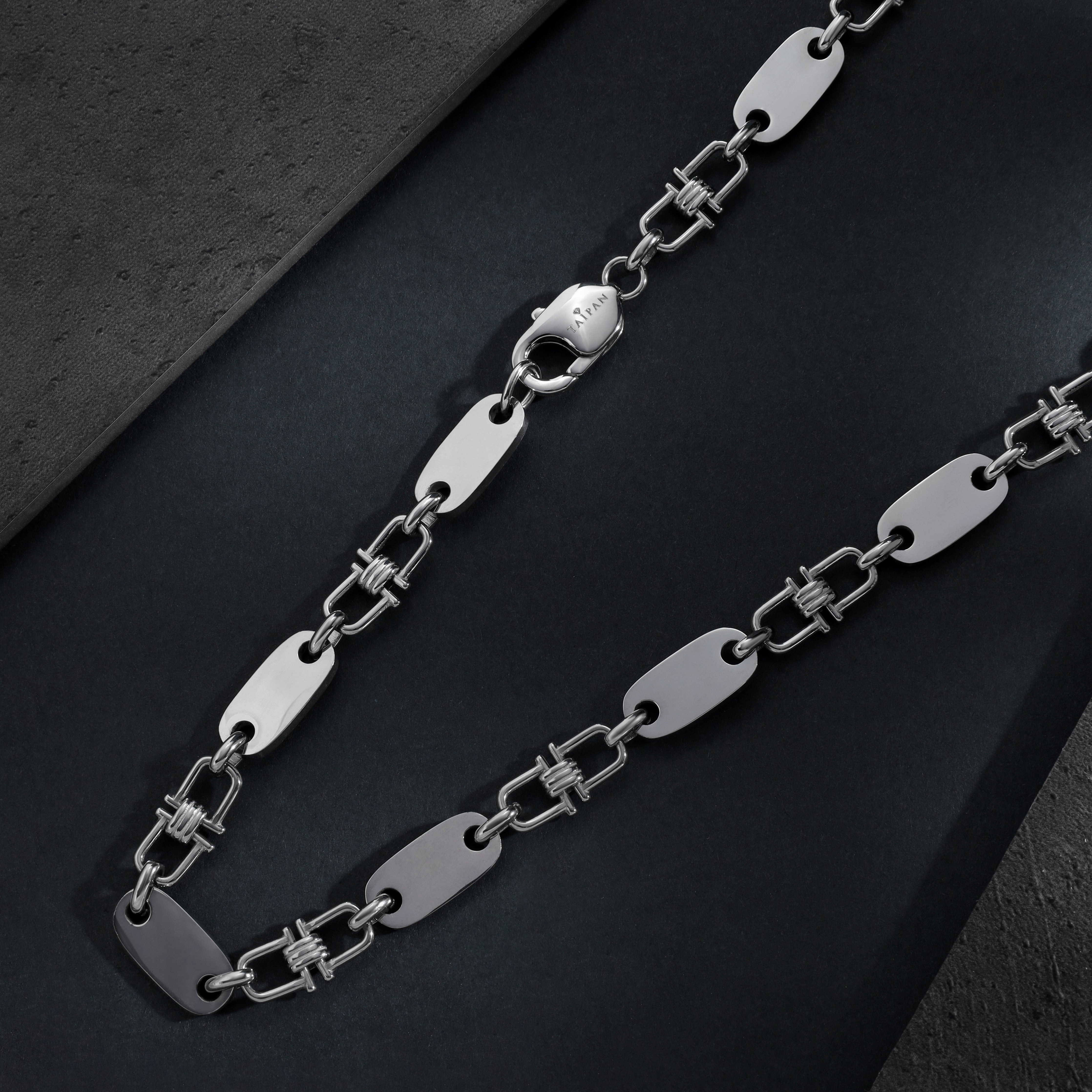 Plattenkette mit beweglichen Steigbügeln 8,5mm breit aus Edelstahl - Taipan Schmuck