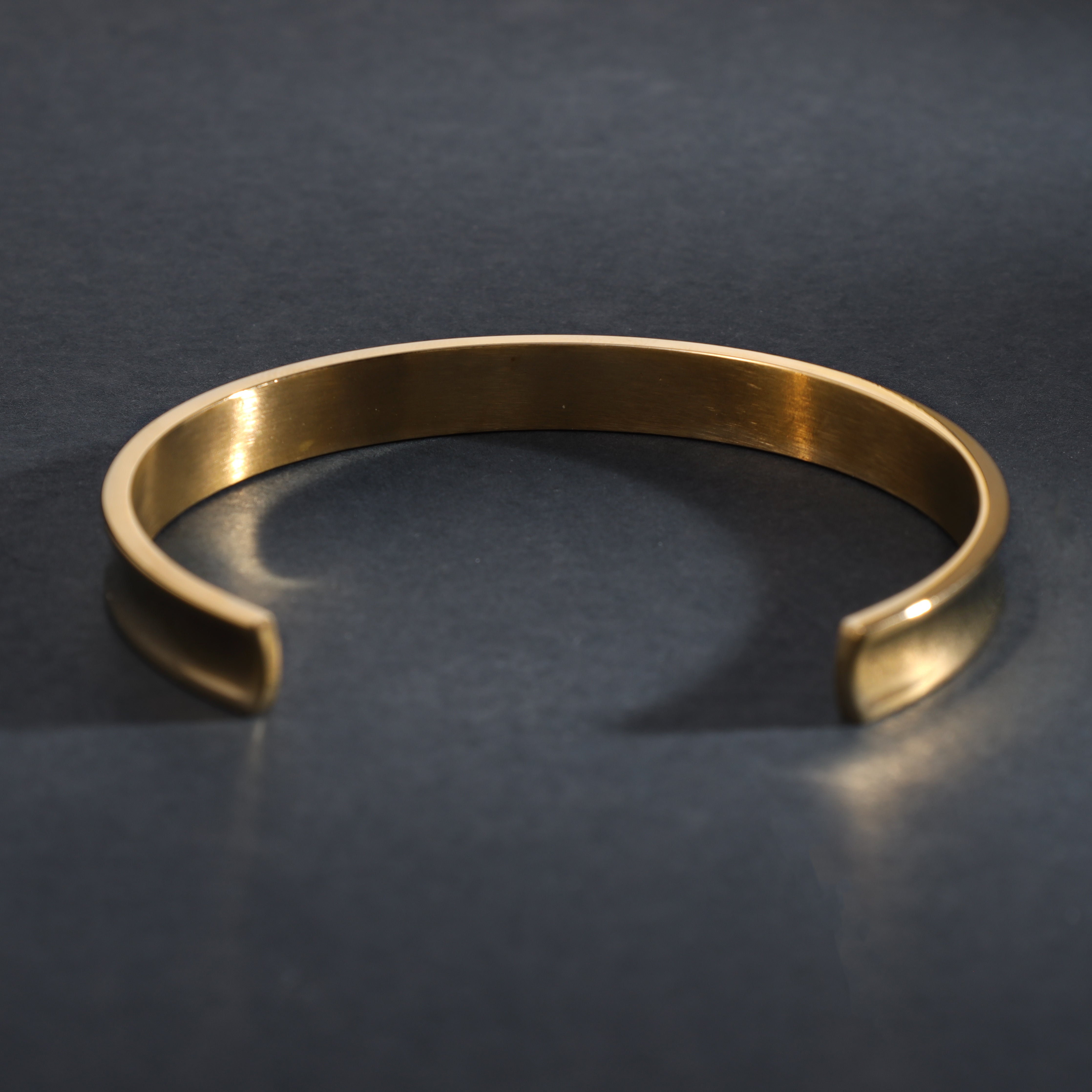 Bangle bracelet 8mm wide made of stainless steel 18K gold plated 