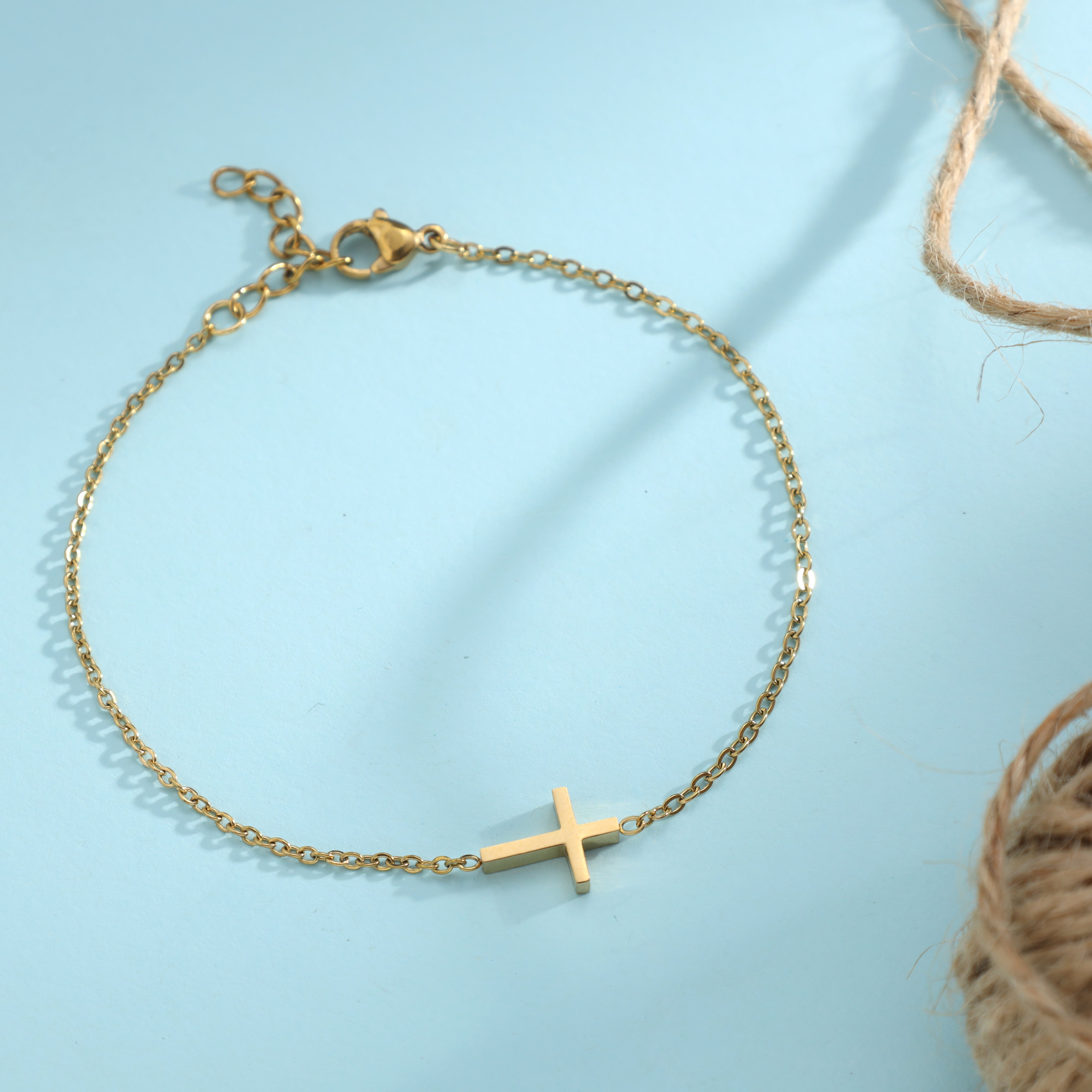 Ladies anchor chain with cross bracelet made of stainless steel 14K gold plated 