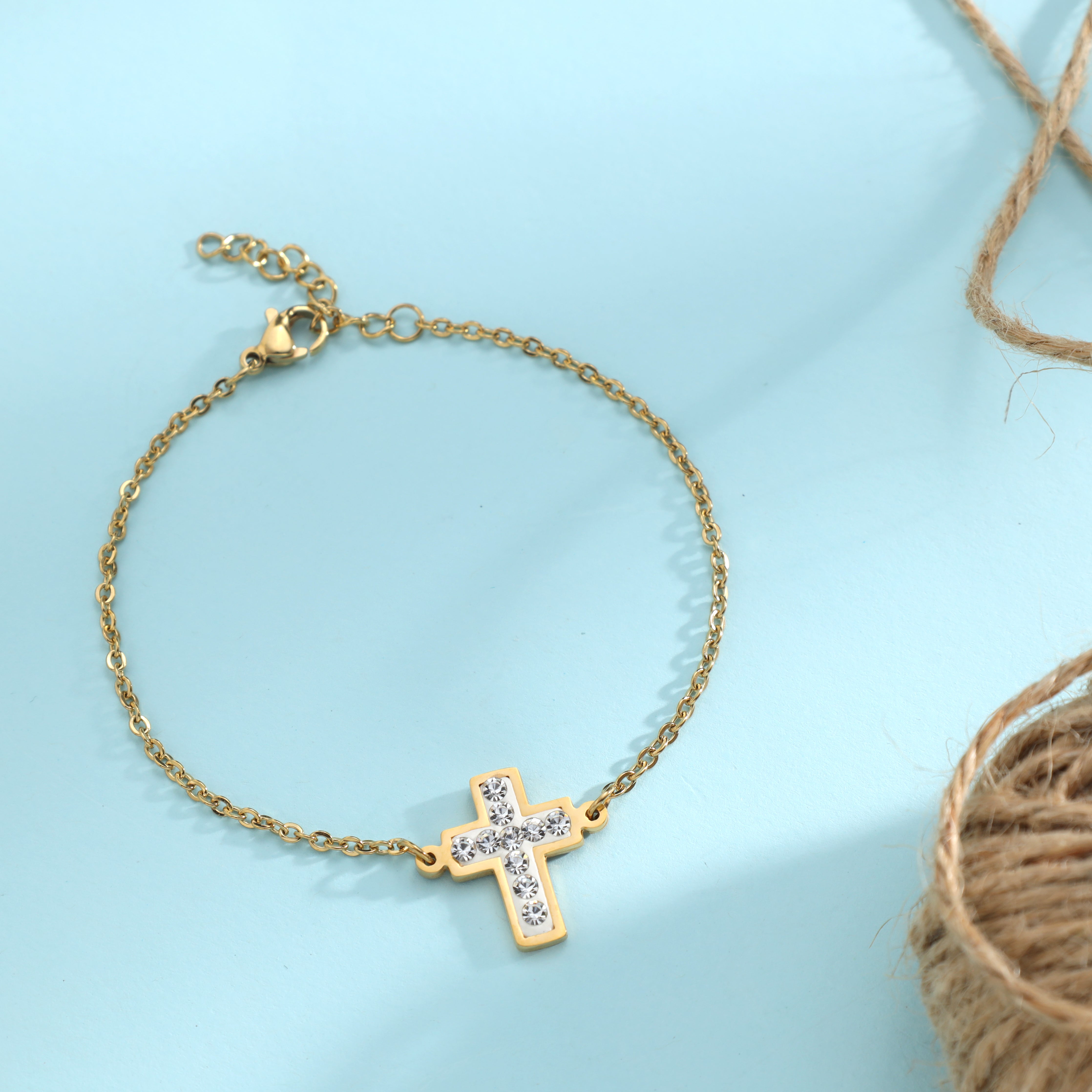 Ladies anchor chain with cross bracelet made of stainless steel 14K gold plated 