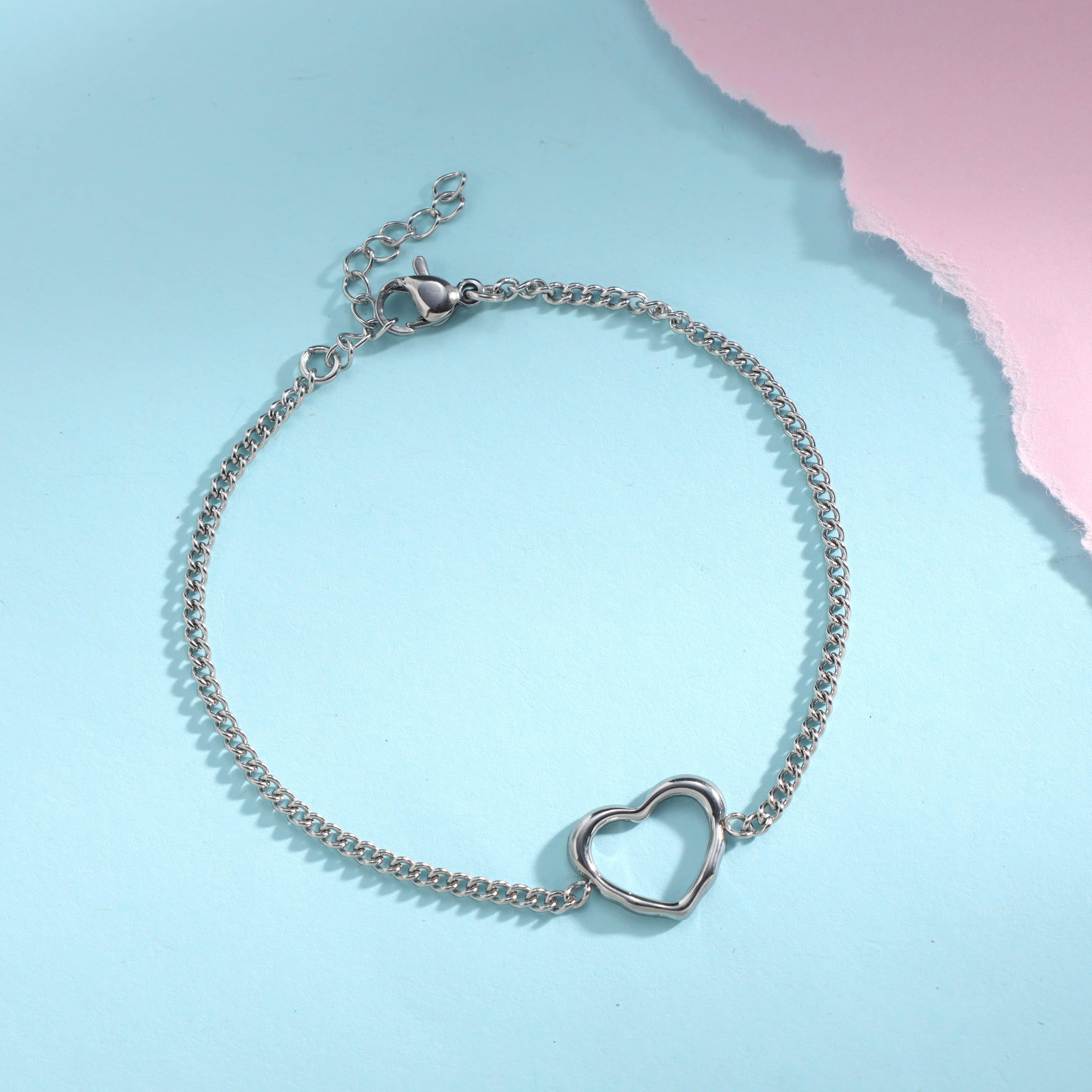 Ladies curb chain bracelet with heart symbol made of stainless steel 