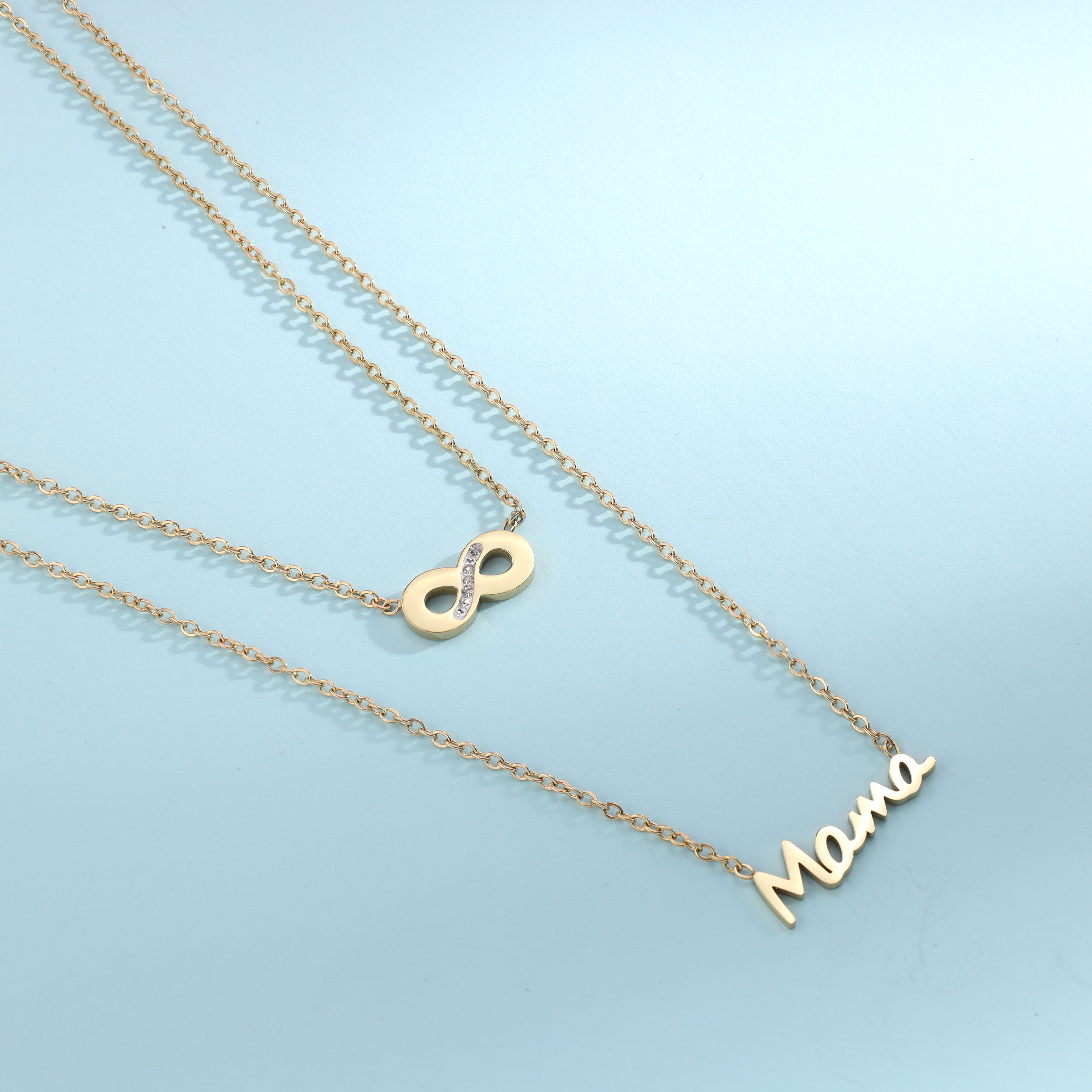 Ladies necklace with Mama pendant made of stainless steel 14K gold plated