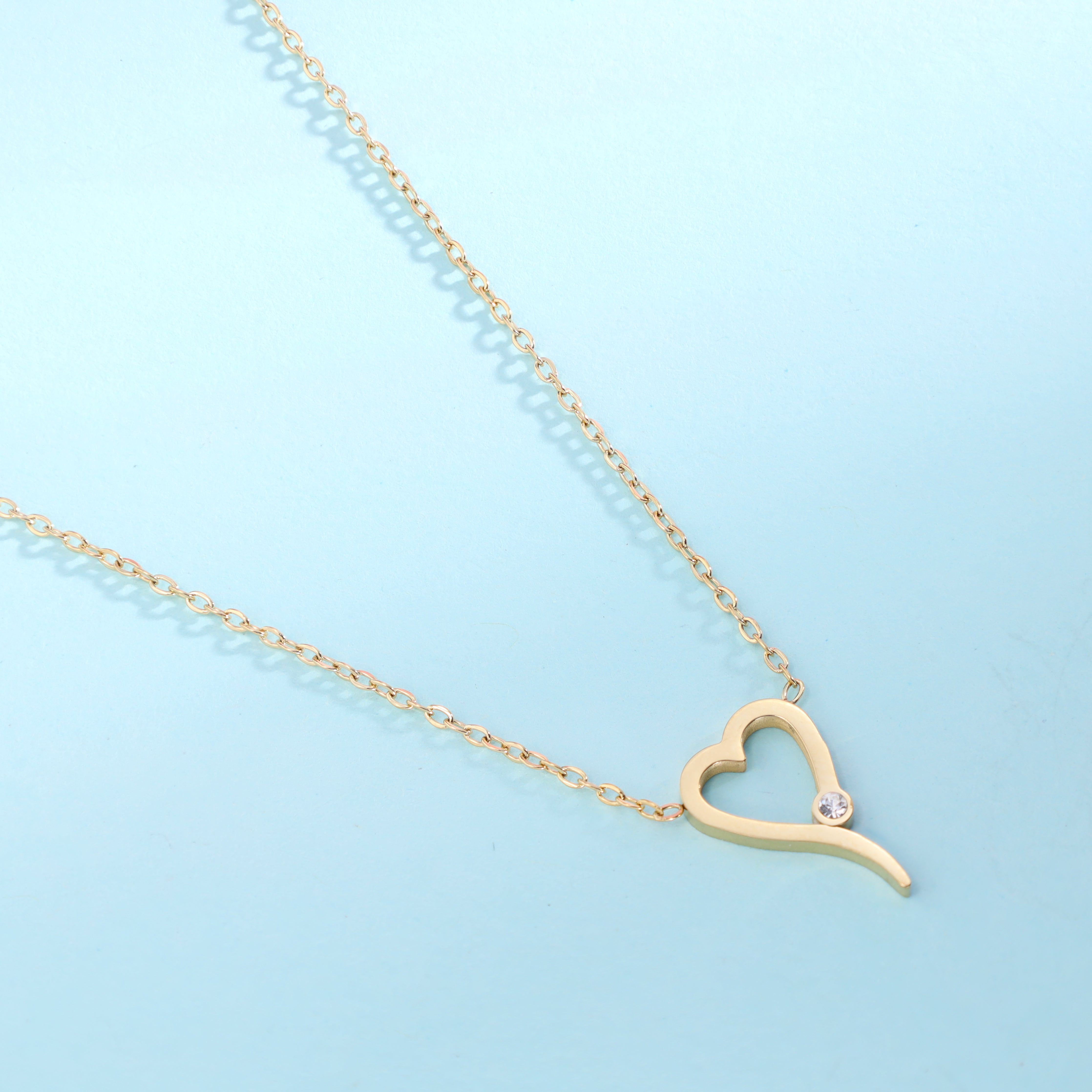 Ladies necklace with heart pendant made of stainless steel 14K gold plated 