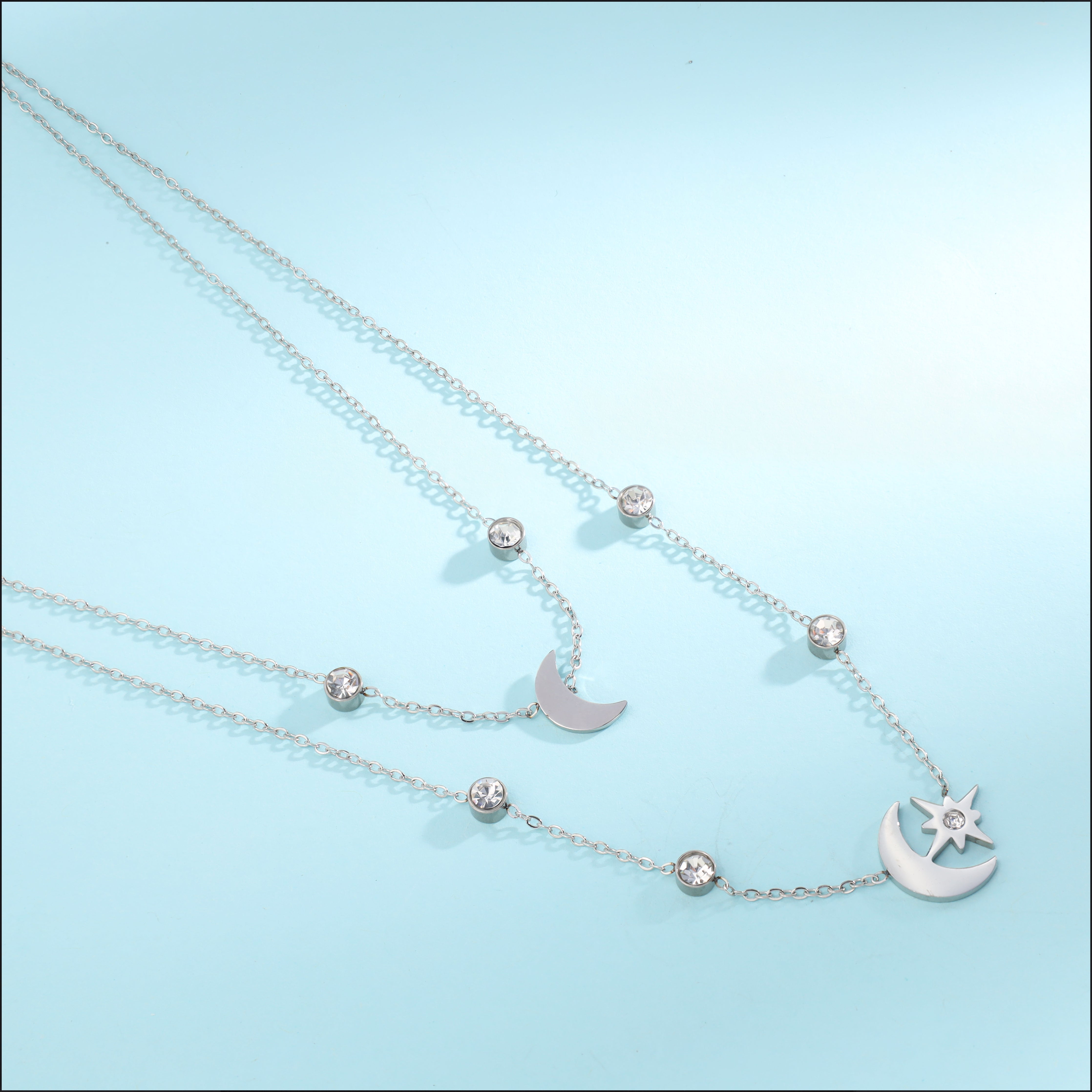 Ladies necklace with star &amp; moon pendant made of stainless steel 