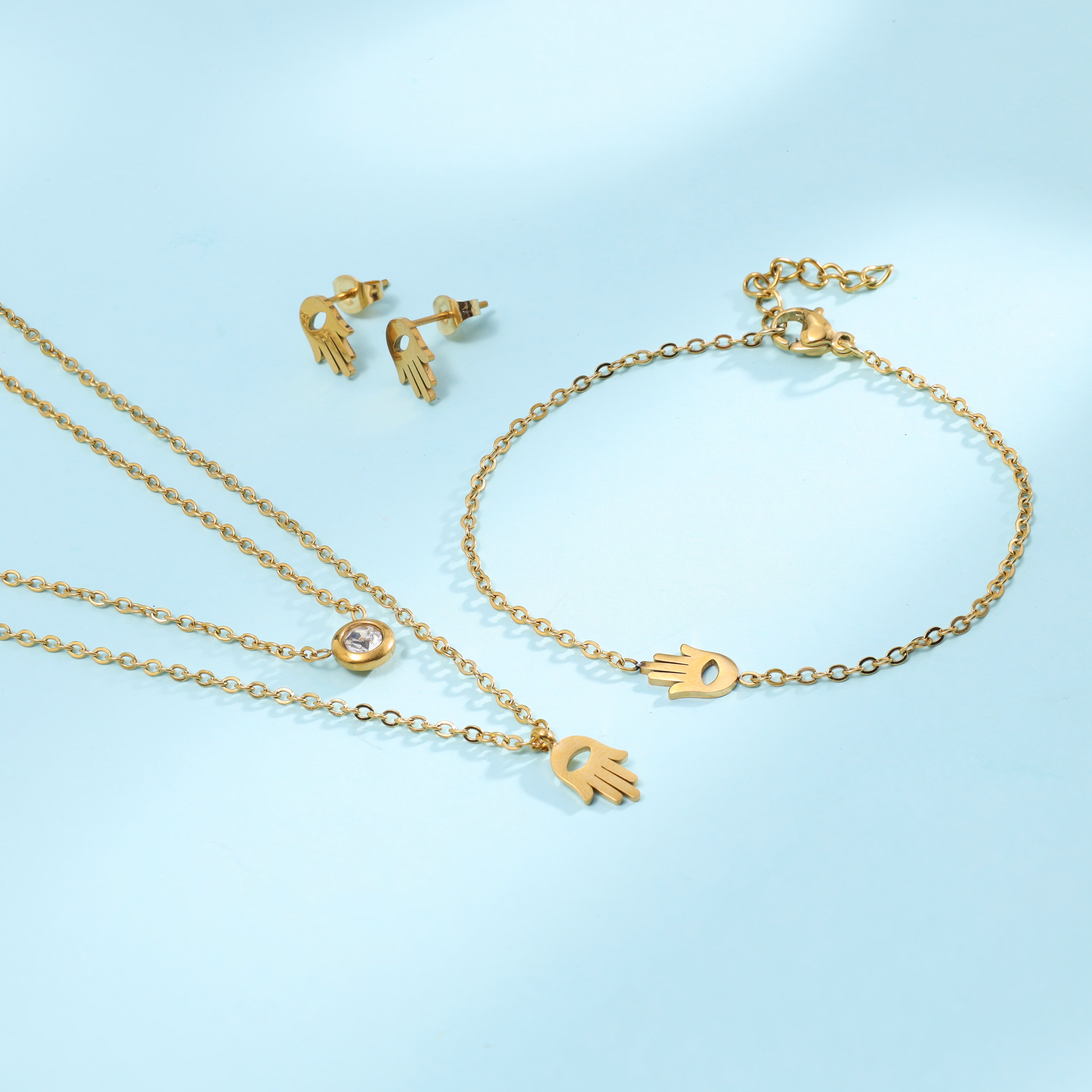 Ladies set anchor chain with round Hand of Fatiam pendant, earrings &amp; bracelet made of stainless steel 14K gold plated 