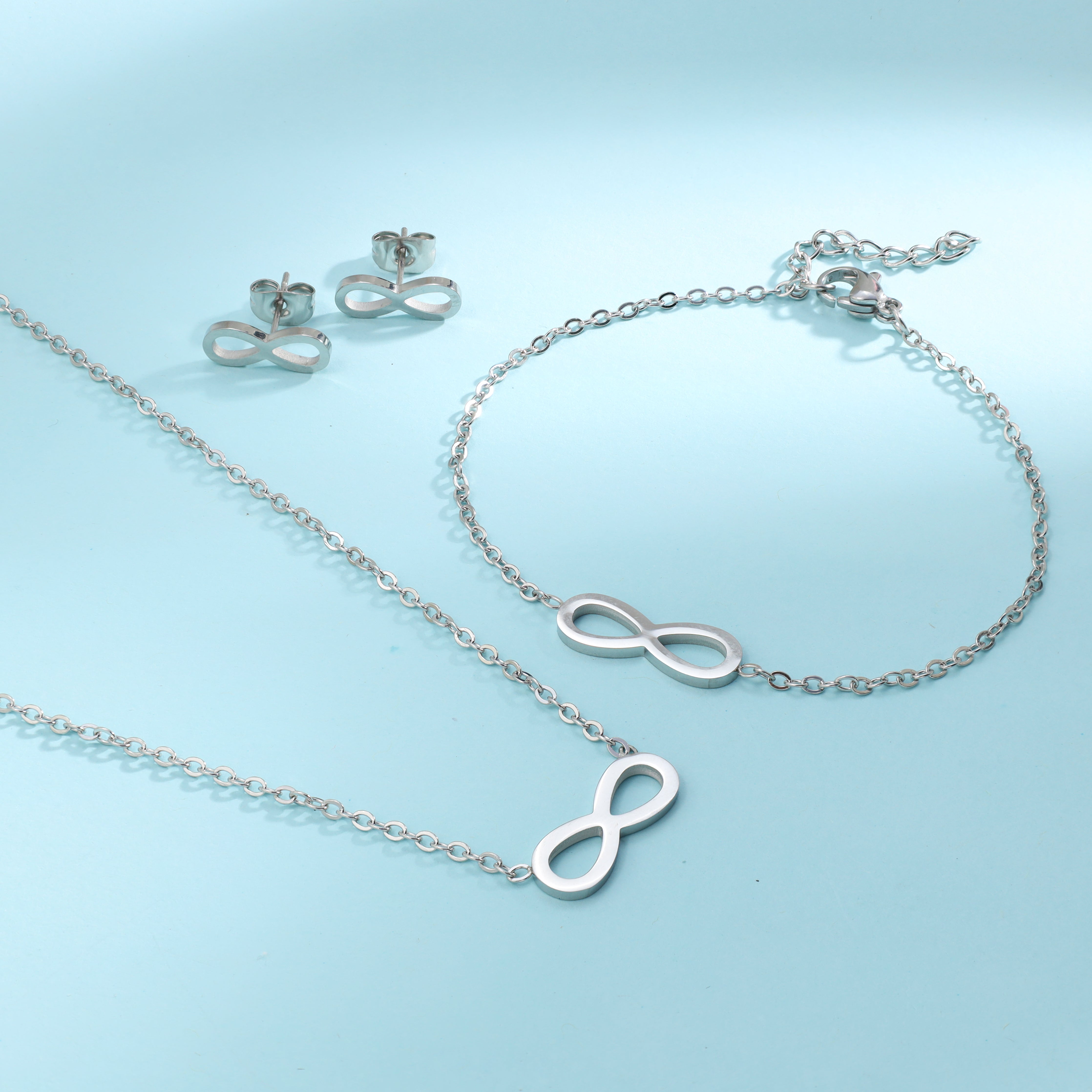 Ladies set anchor chain with infinity pendant, earrings, bracelet made of stainless steel 