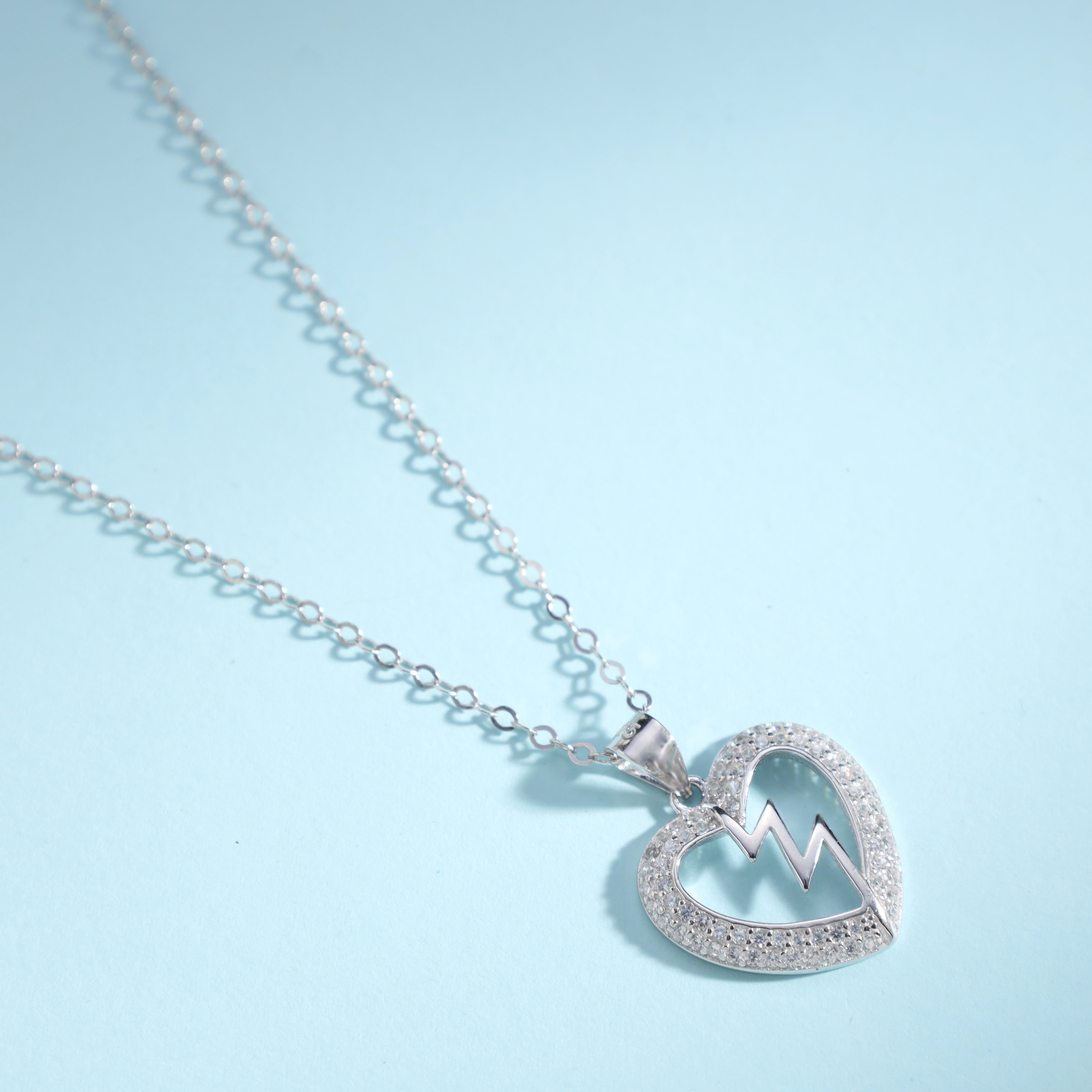 Women's box chain with iced out style heart lightning pendant made of 925 Sterling silver